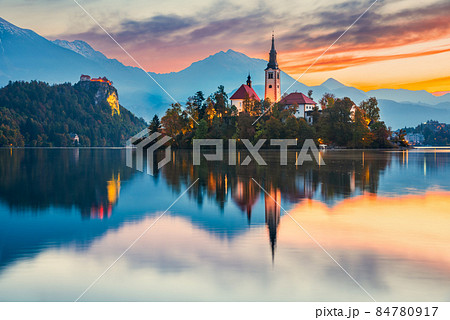 Bled, Slovenia - Sunrise with Julian Alps and Church Santa Maria Bled, Slovenia - Sunrise with Julian Alps and Church Santa Maria 84780917