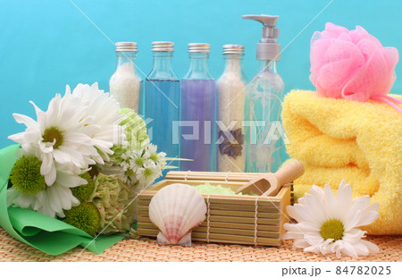 Cosmetics and Spa Products on Bamboo With Towel Cosmetics and Spa Products on Bamboo With Towel 84782025
