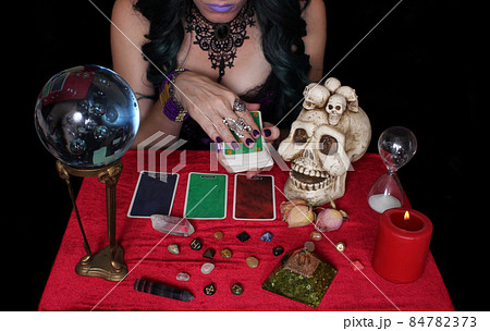 Psychic with crystal ball and tarot cards, Shallow DOF Psychic with crystal ball and tarot cards, Shallow DOF 84782373