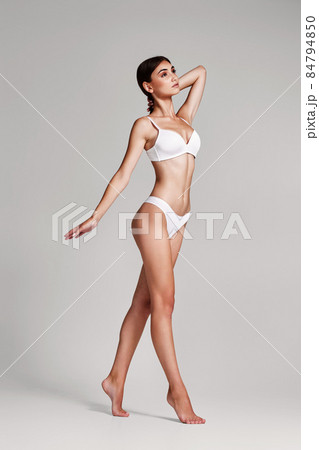 beautiful slender brunette woman with perfect body beautiful slender brunette woman with perfect body 84794850