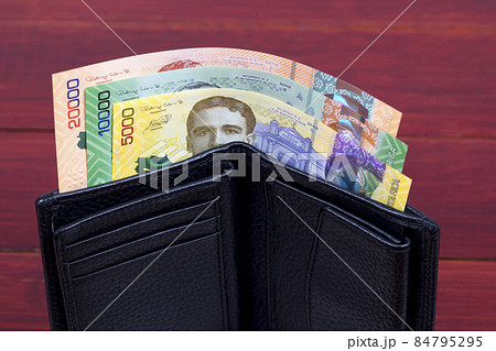 Costa Rican money in the black wallet Costa Rican money in the black wallet 84795295