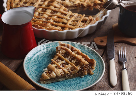 pear pie on wooden board 84798560