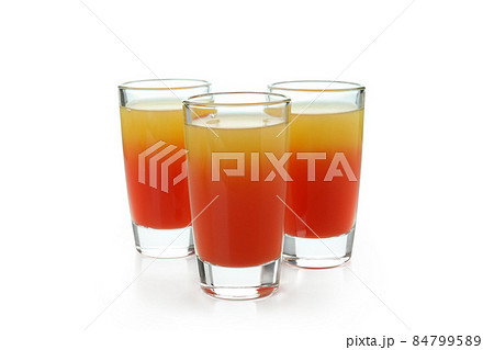 Tequila sunrise cocktail isolated on white background Tequila sunrise cocktail isolated on white background 84799589