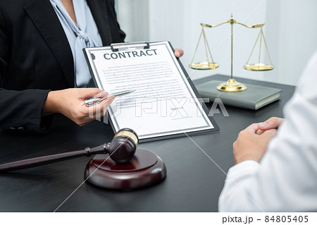 Male lawyer or counselor discussing negotiation legal case with client meeting with document contract in office, law and justice, attorney, lawsuit concept 84805405