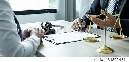 Professional Male lawyer or counselor discussing negotiation legal case with client meeting with document contract in office, law and justice, attorney, lawsuit concept Professional Male lawyer or counselor discussing negotiation legal case with client meeting with document contract in office, law and justice, attorney, lawsuit concept 84805471