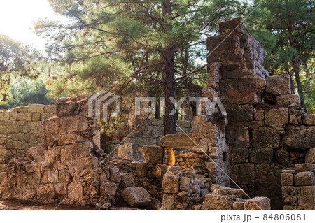 ruins of ancient building among the forest in the antique city of Phaselis 84806081