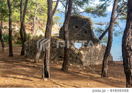 ruins of an ancient Roman building in the forest on the seashore near the antique city of Phaselis, Turkey ruins of an ancient Roman building in the forest on the seashore near the antique city of Phaselis, Turkey 84806088