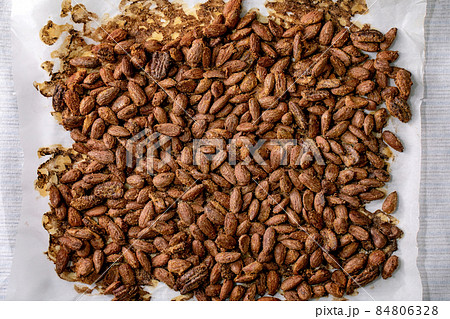 Sweet glazed honey roasted almond nuts. Sweet snack Sweet glazed honey roasted almond nuts. Sweet snack 84806328