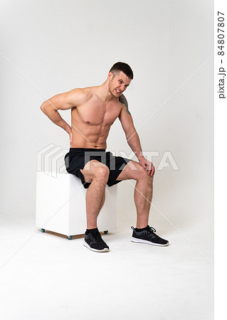 A man back pain keeps his hand on his back pain sore injury, backache person background stress, illness Tension neck care, ain suffer attractive A man back pain keeps his hand on his back pain sore injury, backache person background stress, illness Tension neck care, ain suffer attractive 84807807