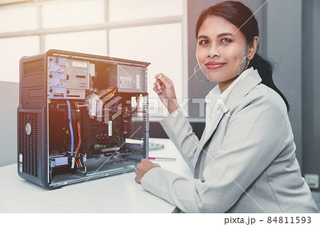 IT women staff officer work in office computer hardware fix repair service working happy smile 84811593