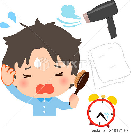 焦って寝ぐせを直すパジャマ姿の男性 84817130