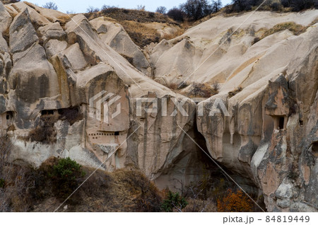 Landscape view of Unesco World Heritage, Cappadocia, Turkey under cloudy sky Landscape view of Unesco World Heritage, Cappadocia, Turkey under cloudy sky 84819449