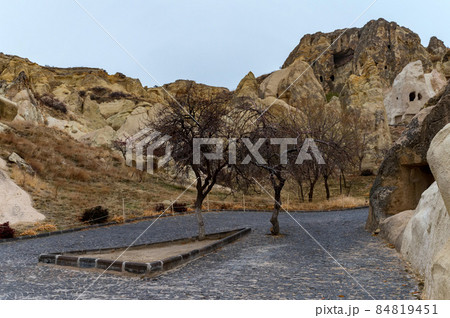 Landscape view of Unesco World Heritage, Cappadocia, Turkey under cloudy sky Landscape view of Unesco World Heritage, Cappadocia, Turkey under cloudy sky 84819451