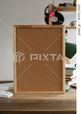 Cork board frame background on table in office. Student home workplace Cork board frame background on table in office. Student home workplace 84821685