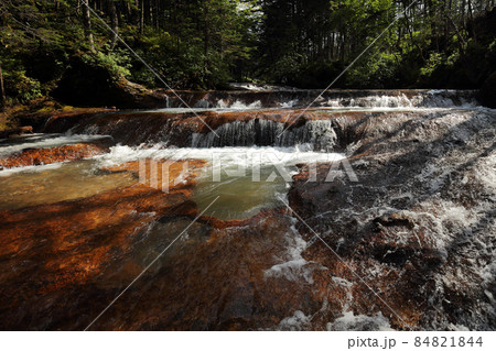 Hot river near volcano Mendeleev (Rausu-dakein Japanese. Love place for local peaple.) 84821844