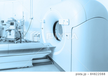 Medical CT or MRI Scan in the modern hospital laboratory. Interior of radiography department. Technologically advanced equipment in white room. Magnetic resonance diagnostics machine. Medical CT or MRI Scan in the modern hospital laboratory. Interior of radiography department. Technologically advanced equipment in white room. Magnetic resonance diagnostics machine. 84822088