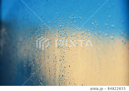 Abstract background. Drops on window glass. Color image. Abstract background. Drops on window glass. Color image. 84822655
