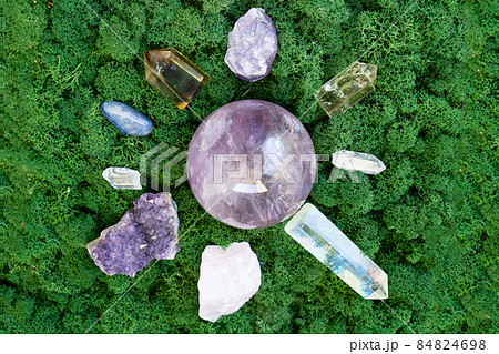 Healing crystals on brown background 84824698
