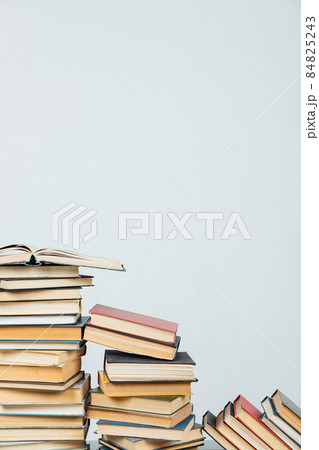 stacks of old books for learning in the library on a white background 84825243