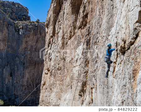 People doing rock climbing sports 84829222