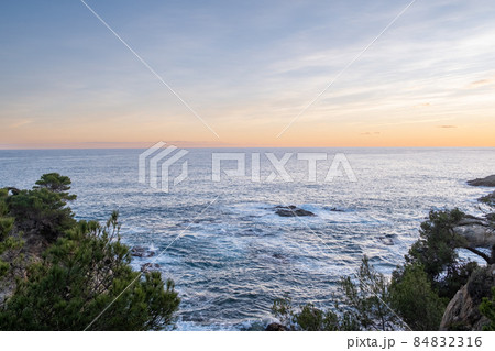 Evening time sea with beautiful dramatic sky with some clouds 84832316