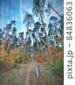 Magic forest with bright colors and a girl 84836063