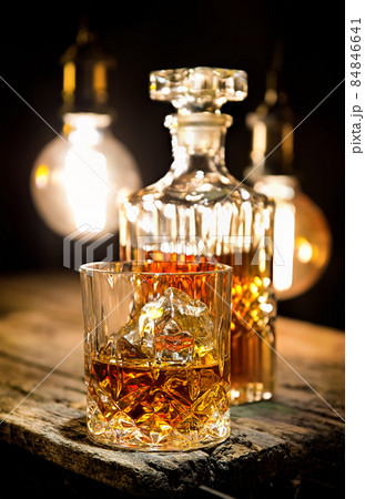 Whiskey and lamp lighting 84846641