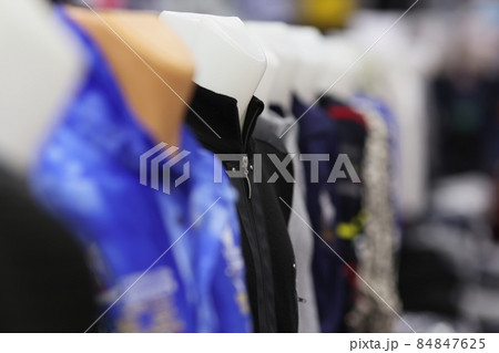 Set of mannequins with clothes on it placed in line 84847625