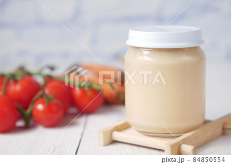 baby food in a container on table with copy space. 84850554