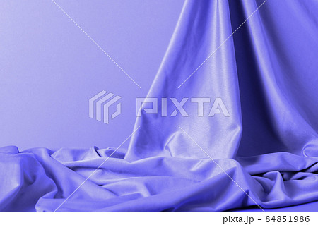 Chic velvet fabric curtain in trendy lavender color pery. Catwalk to advertise products trending color 2022. Copy space horizontal frame 84851986