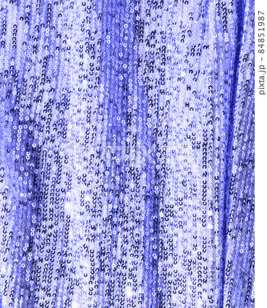 Textured background shiny fabric with lurex sequins and trendy color very peri, sparkles. Soft selective focus, blurred Mockup of promotional items in 2022 colors 84851987