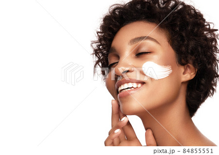 African American skincare models with perfect skin and curly hair. Beauty spa treatment concept. African American skincare models with perfect skin and curly hair. Beauty spa treatment concept. 84855551