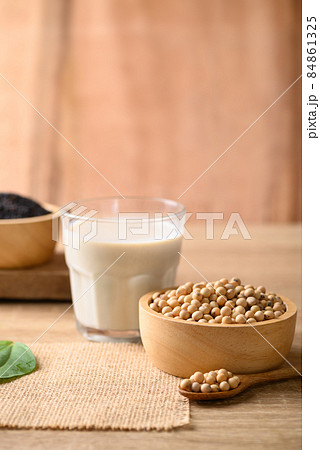 Soy milk with black sesame on wooden background, Healthy drink Soy milk with black sesame on wooden background, Healthy drink 84861325