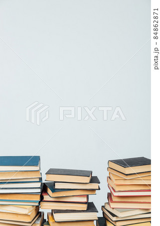 stacks of old books for learning in the library on a white background 84862871