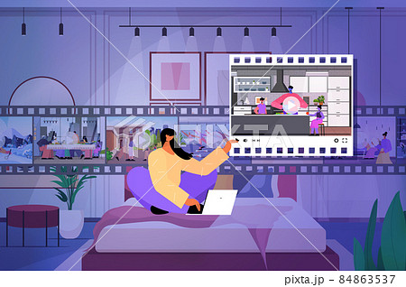 woman blogger sharing or watching videos at social networks making posts for followers social media addiction woman blogger sharing or watching videos at social networks making posts for followers social media addiction 84863537