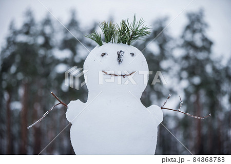 Beautiful snowman. Making a snowman, first snow. Beautiful snowman. Making a snowman, first snow. 84868783