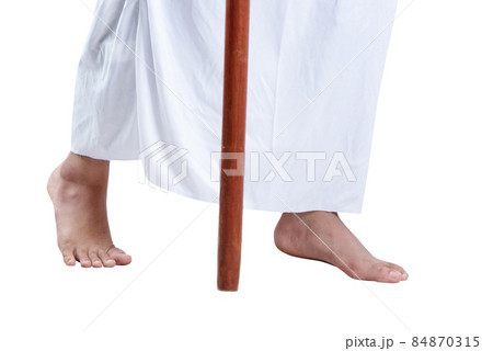 Jesus Christ walking with stick 84870315