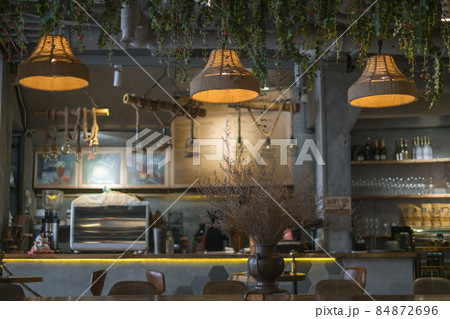 Chandeliers made from the rope. Bar counter in the coffee shop. Coffee shop interior. High quality photo 84872696