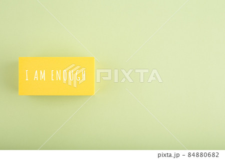 I am enough and self acceptance minimal concept on bright beige background with copy space I am enough and self acceptance minimal concept on bright beige background with copy space 84880682