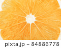 Orange citrus fruit slice macro closeup background texture 84886778