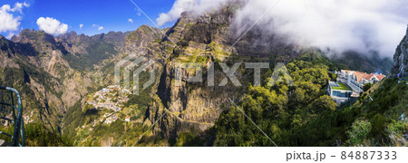 Madeira travel and landmarks. Curral das Freiras ('Nuns Valley') - magnificent village located in the heart of island surrounded by highest mountains Madeira travel and landmarks. Curral das Freiras ('Nuns Valley') - magnificent village located in the heart of island surrounded by highest mountains 84887333