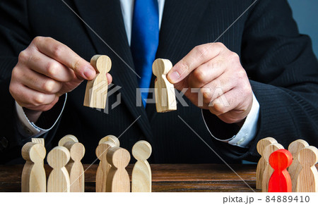 A businessman evaluates candidates for employment. Staff and Human Resource Management. Team building. Personnel selection. Staffing, recruiting and training workers. Appointment to posts. Employment. A businessman evaluates candidates for employment. Staff and Human Resource Management. Team building. Personnel selection. Staffing, recruiting and training workers. Appointment to posts. Employment. 84889410