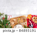 Xmas cookie for Christmas and Happy New Year. Gingerbread with decoration at home. 84893191
