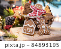 Xmas cookie for Christmas and Happy New Year. Gingerbread with decoration at home. 84893195