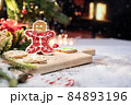 Xmas cookie for Christmas and Happy New Year. Gingerbread with decoration at home. 84893196