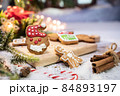 Xmas cookie for Christmas and Happy New Year. Gingerbread with decoration at home. 84893197