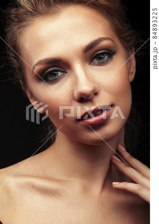 young sensual blond woman posing on black background, lifestyle people concept young sensual blond woman posing on black background, lifestyle people concept 84893225