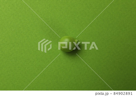 Green pea seed on green background, close up 84902891