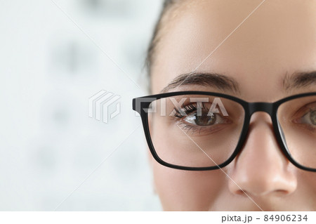 Woman face, female wear glasses for better vision with black frame Woman face, female wear glasses for better vision with black frame 84906234