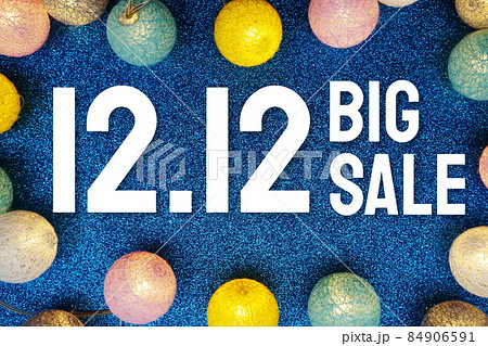12.12 Big Sale text and LED cotton Balls Decoration on blue Glitter background 84906591